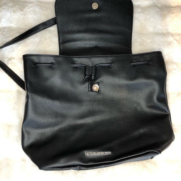 Victoria Secrets Faux Leather backpack pull close with magnetic closure. main image 4